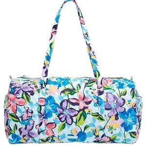 Blue floral print
Two 15” straps
One zipper
New with tags
22”L x 11”H x 11” D